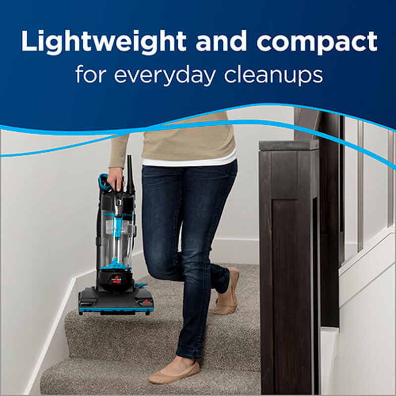 Woman carrying LightWeight PowerForce. Text: LightWeight and Compact for Everyday CleanUps.