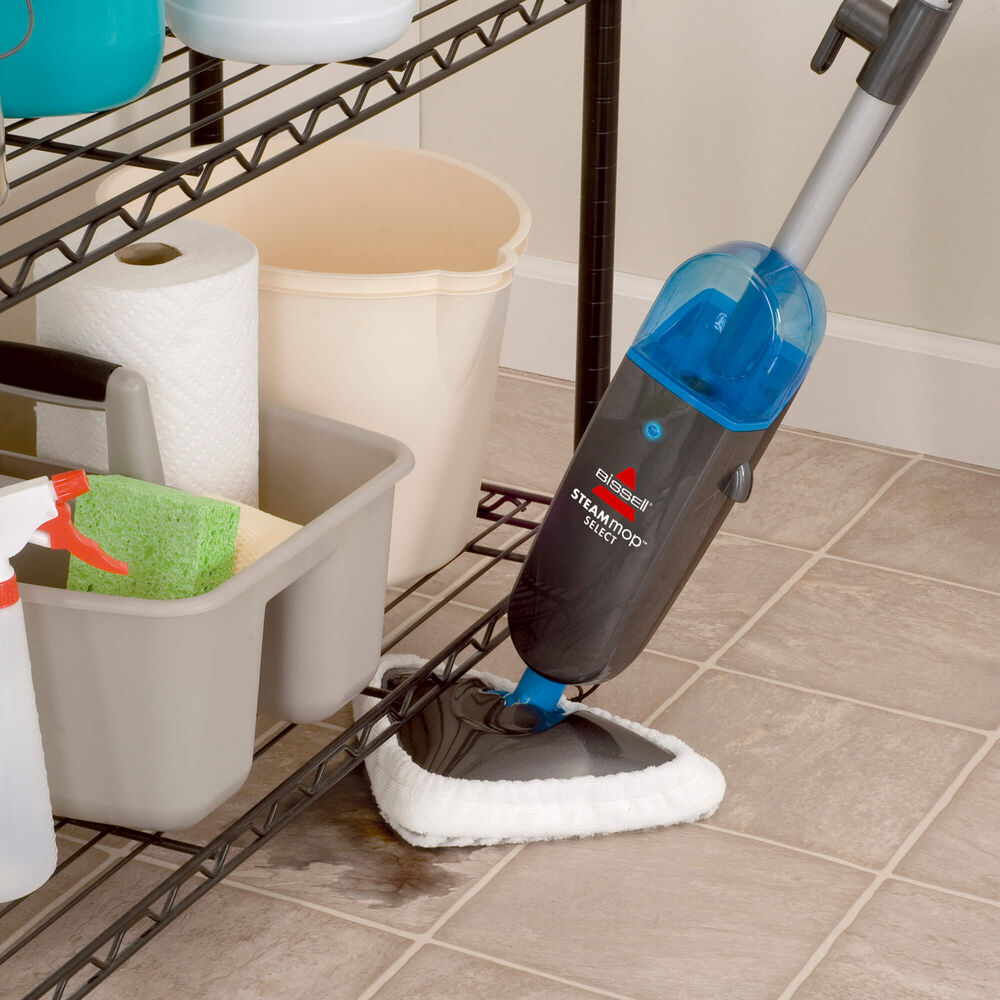 Steam Mop Select Steam Cleaner - Steam cleaner cleaning sticky mess on tile flooring Expanded View